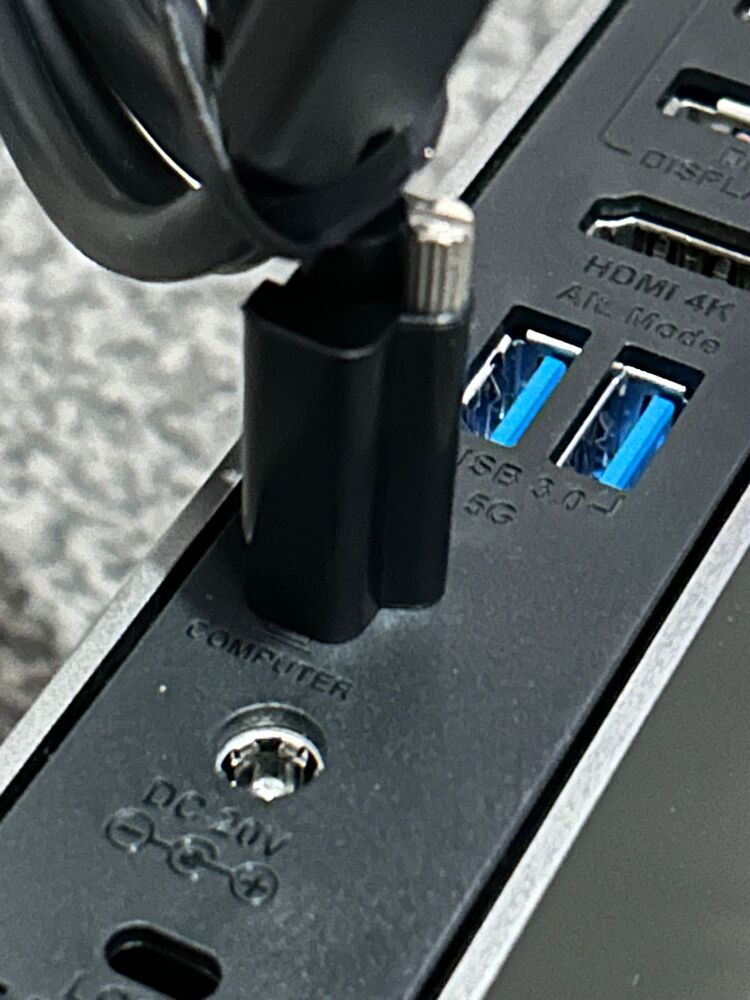 The dock's screw in cable holder - different angle