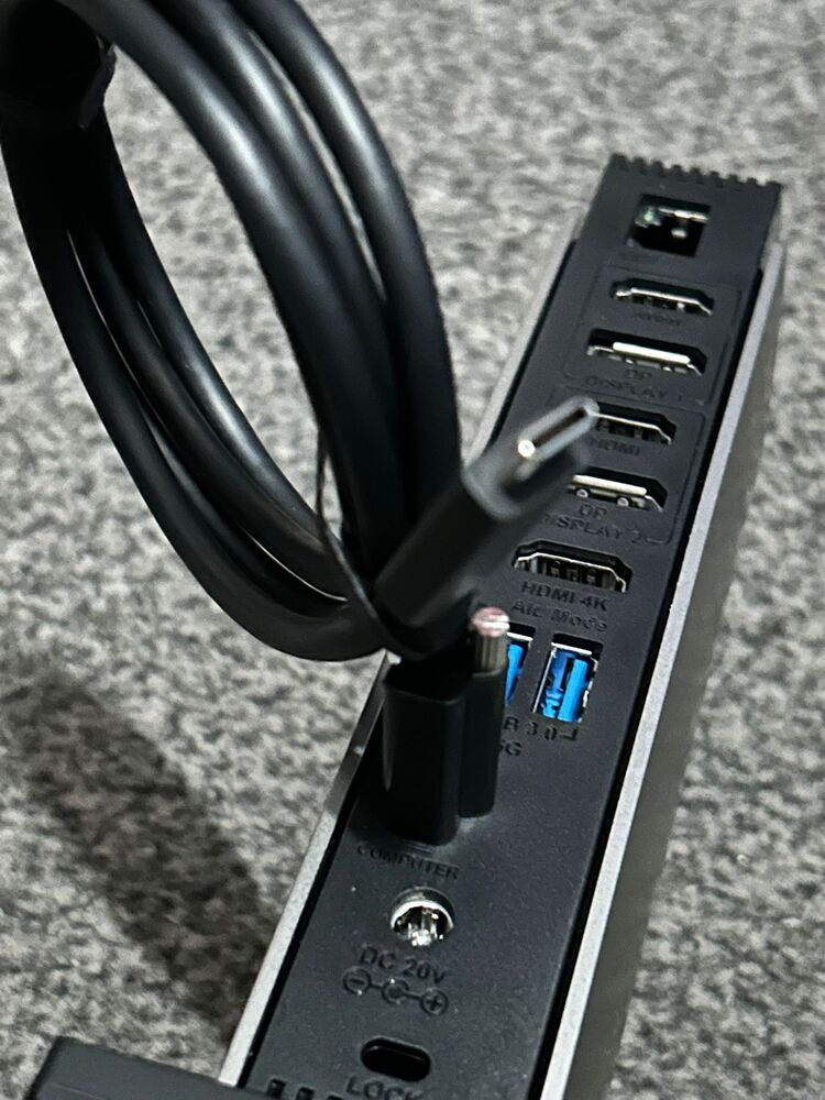 The dock's screw in cable holder